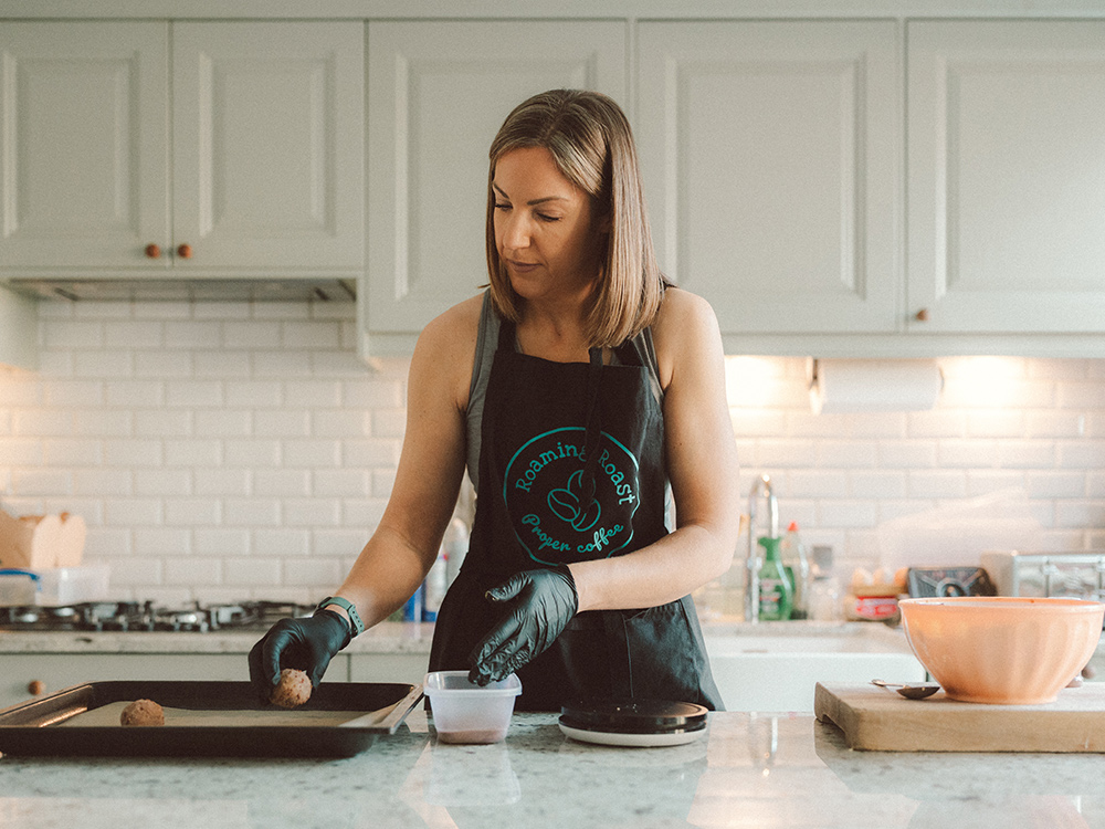 Abbi preparing homemade treats in the kitchen for Roaming Roast